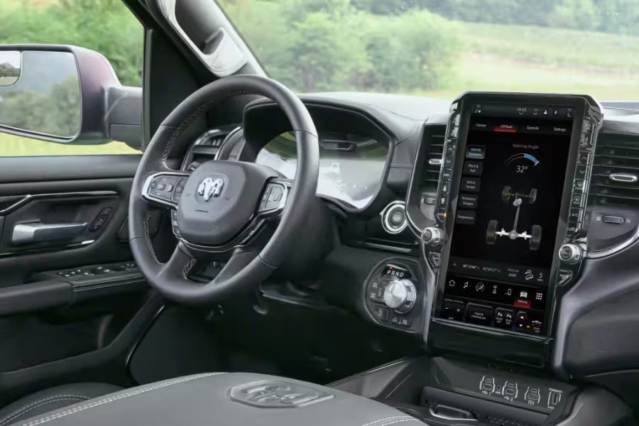 Ram 1500 dashboard with digital displays and Uconnect touchscreen