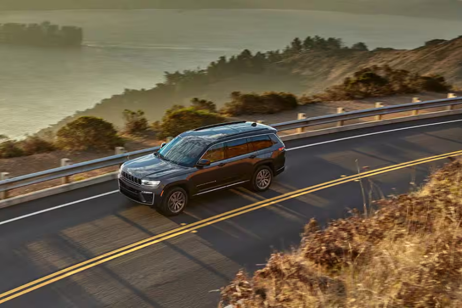 Chrysler Dodge Jeep or Ram vehicle driving during warm Michigan weather
