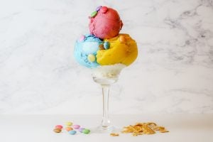 Colorful sorbet in a glass cup.