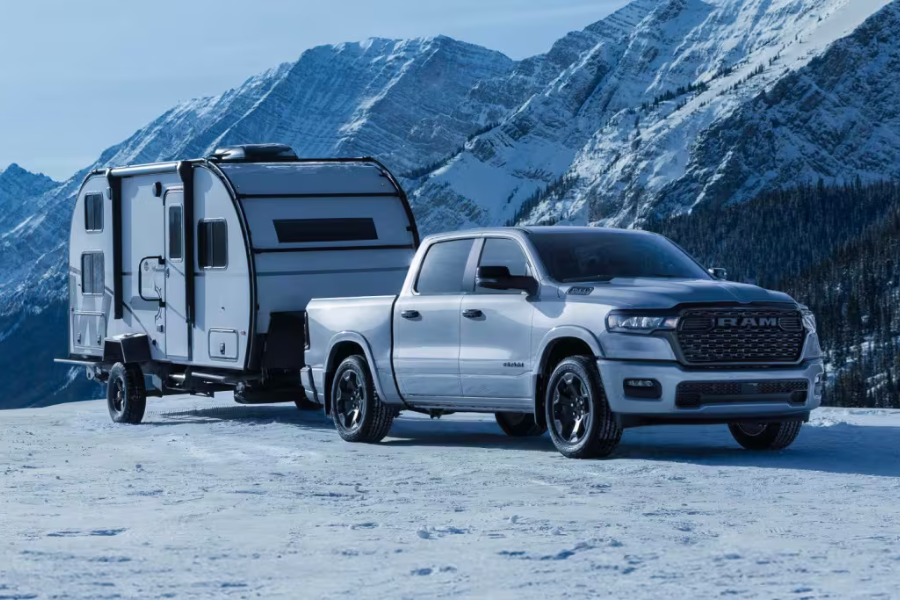 Ram 1500 towing a travel trailer through winter conditions