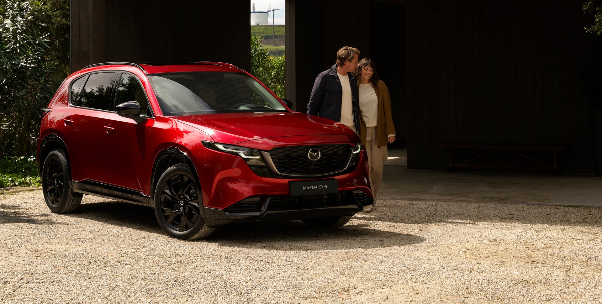 2026 Mazda CX-5 front three-quarter view in red