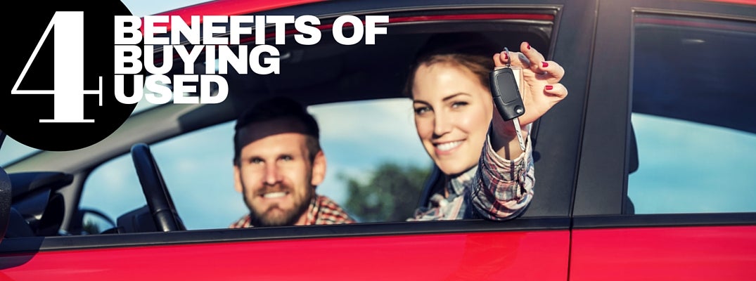 Car owners enjoying the benefits of buying a used car