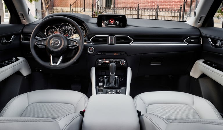 Steering-wheel-and-touchscreen-display-inside-2018-Mazda-CX-5