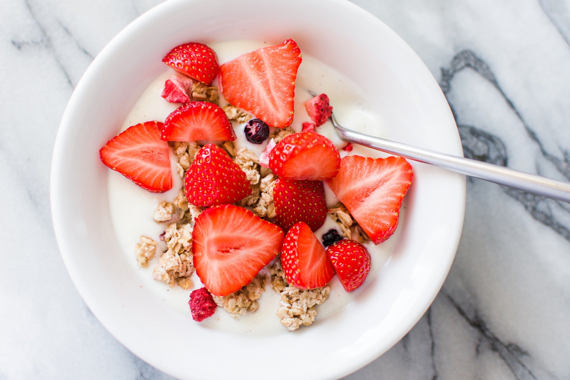 cereal with strawberries and granola