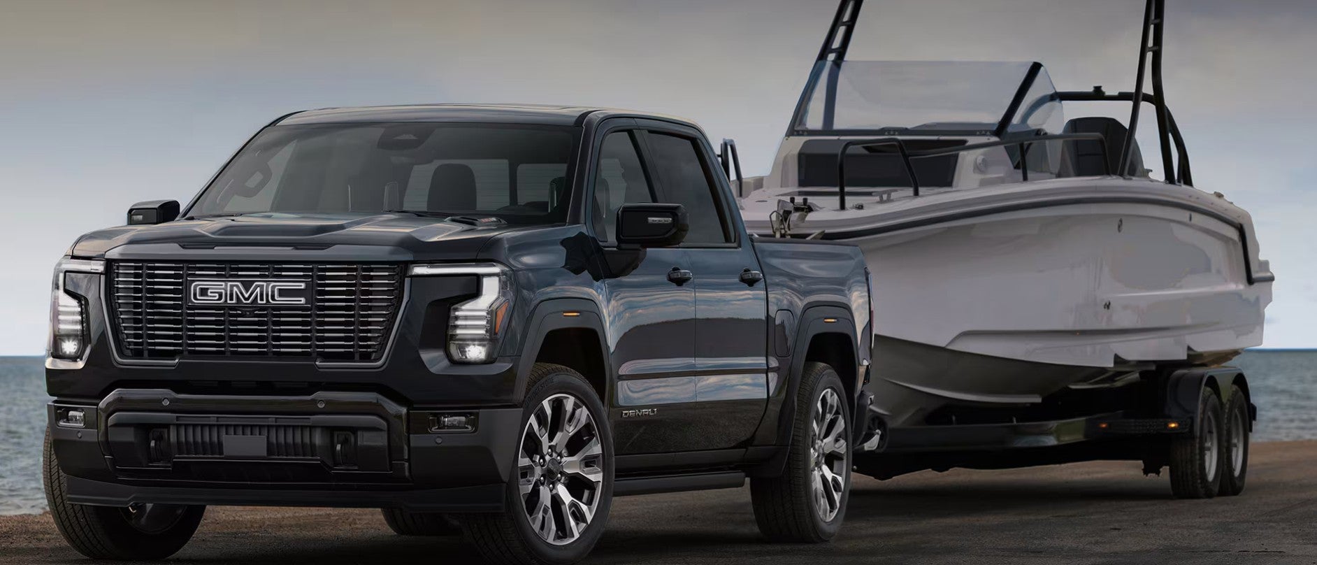 Black 2027 GMC Sierra 1500 with boat