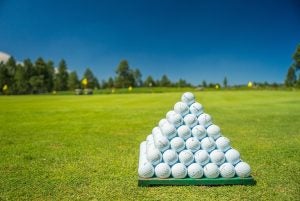 Close up of golf balls in shape of pyramid | Madison, VA