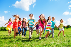 Kids running in a field