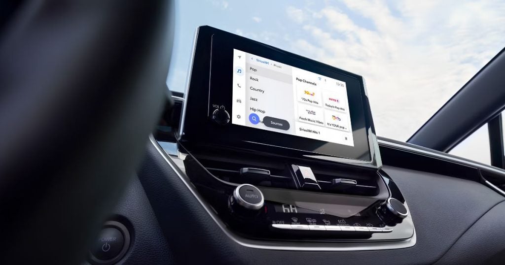 The audio multimedia touchscreen display inside the used Toyota Corolla