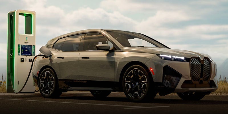 2025 BMW iX at a charging station