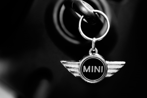 Mini keychain hanging from key in the ignition