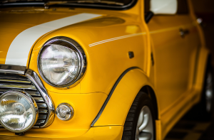 Front driver side view of yellow MINI