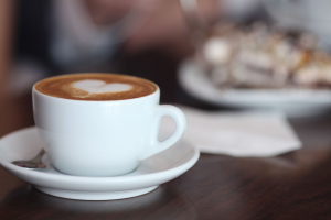 Cup of cofee with heart at the top