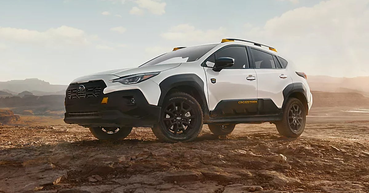 A 2026 Subaru Crosstrek parked off-road in a desert