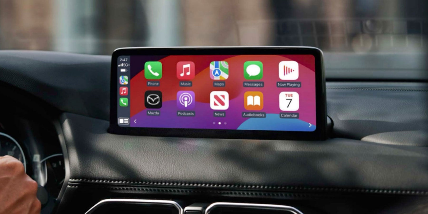 Apple CarPlay Display on the dash of a Mazda