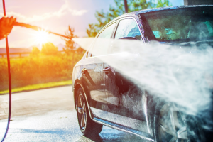 Car getting sprayed for a car wash