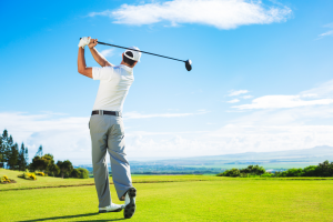 Man playing golf