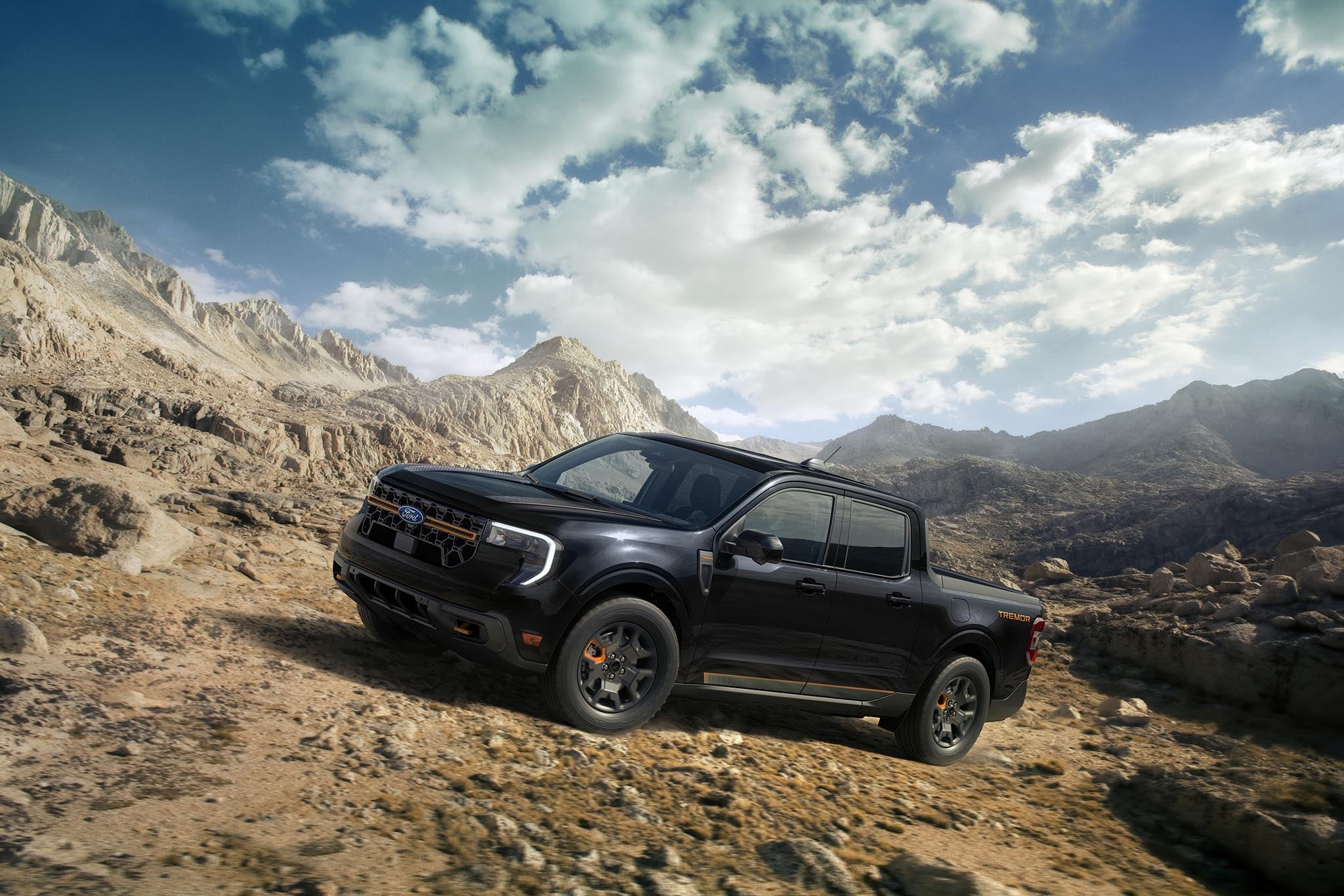 Ford Maverick Tremor model being driven up a rocky mountainside