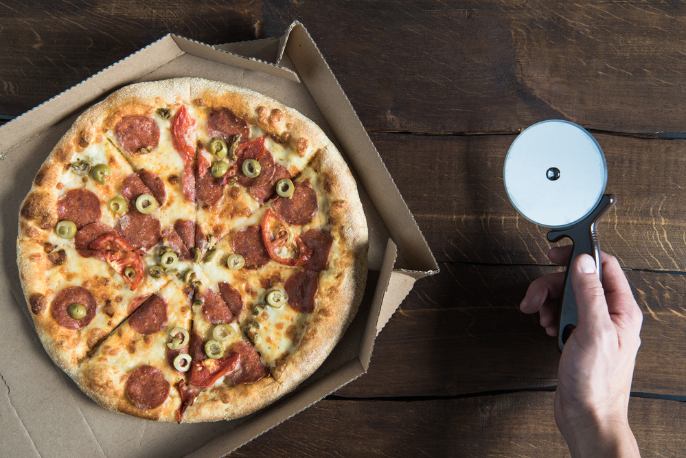 top view of pizza with pepperoni and veggies