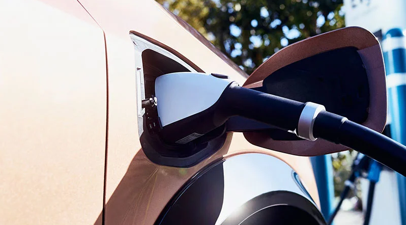 A 2024 Nissan ARIYA charging in Medina, OH 