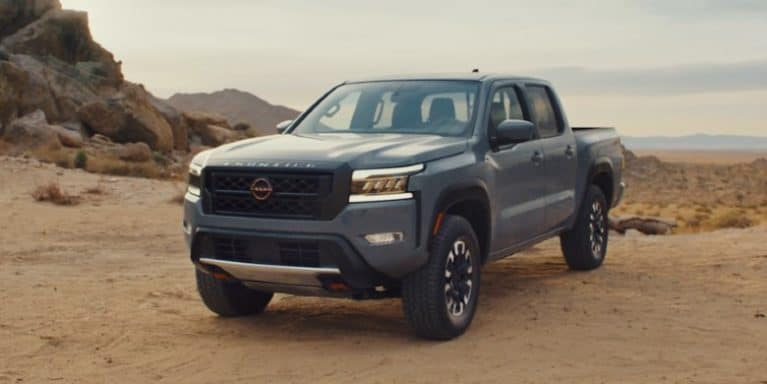 A 2022 Nissan frontier parked in a desert
