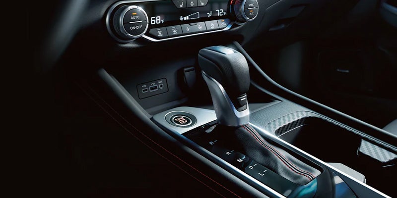 The center console of a 2024 Nissan Sentra decked out with accessories in Mayfield Heights, OH