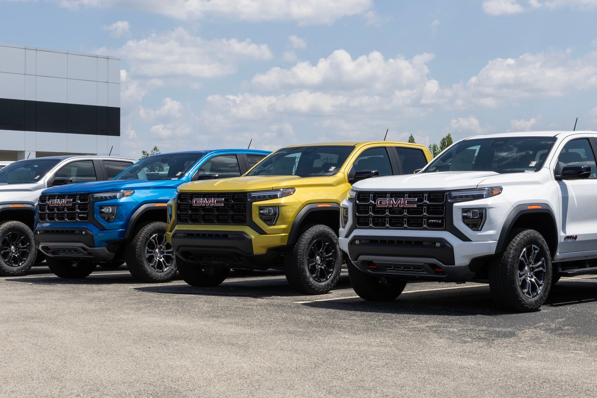 Fishers - July 7, 2024: GMC Canyon Mid-Size pickup display at a dealership. GMC offers the Canyon in Elevation, AT4, Denali, and AT4X models.