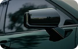 Power-folding outside mirrors