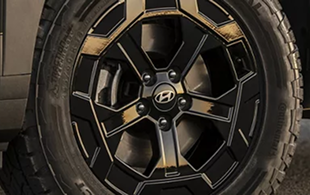 18-inch dark alloy wheels with all-terrain tires