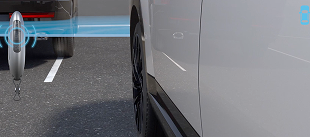 Step out and press a button. It parks itself