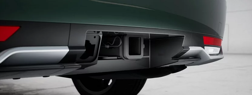 Close-up of the integrated tow hitch under the rear bumper of a Hyundai Palisade