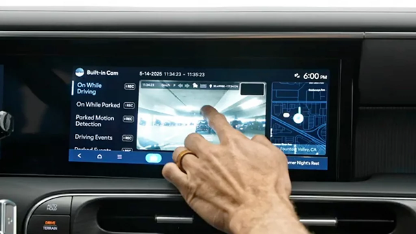 A finger selecting a recording mode on the Palisade Built-in Dash Cam screen