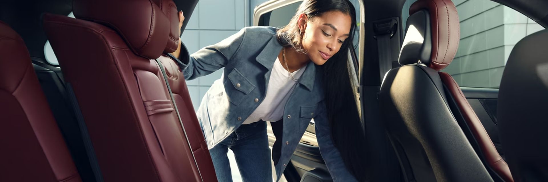 Customer inspecting certified pre-owned Lincoln at Chantilly dealership