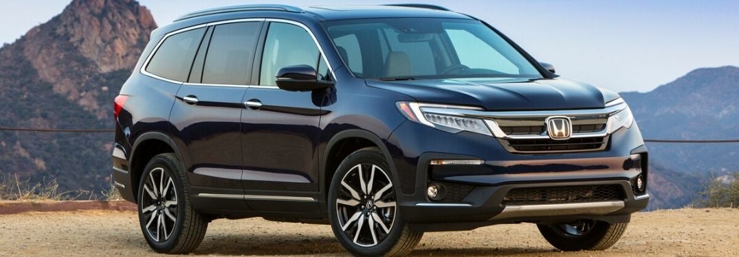 Blue 2021 Honda Pilot Front Exterior in a Desert