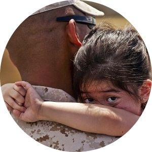 U.S. Marine Holding His Daughter