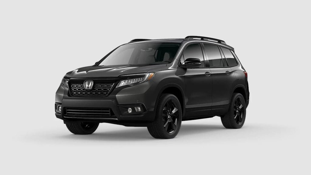 Modern Steel Metallic 2020 Honda Passport on Gray Background