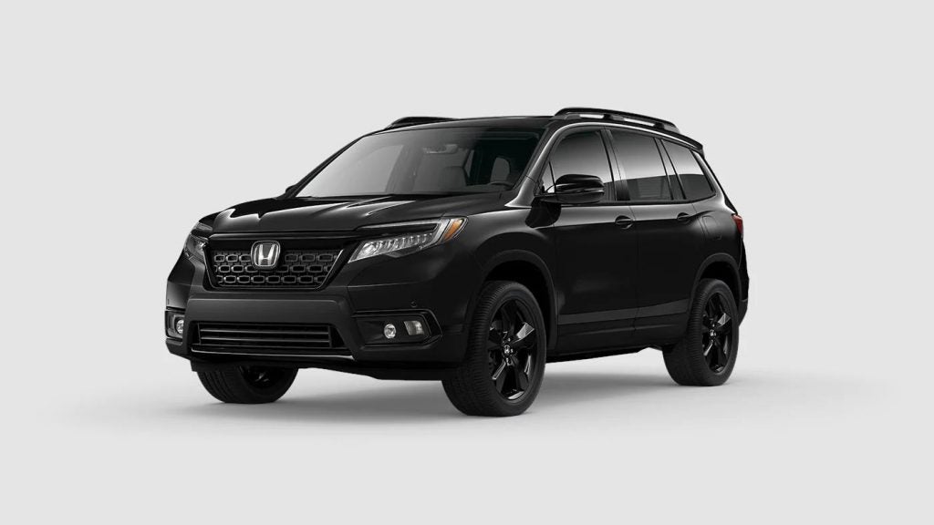 Crystal Black Pearl 2020 Honda Passport on Gray Background