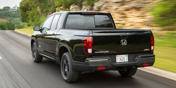 Black 2020 Honda Ridgeline Rear Exterior on Country Road