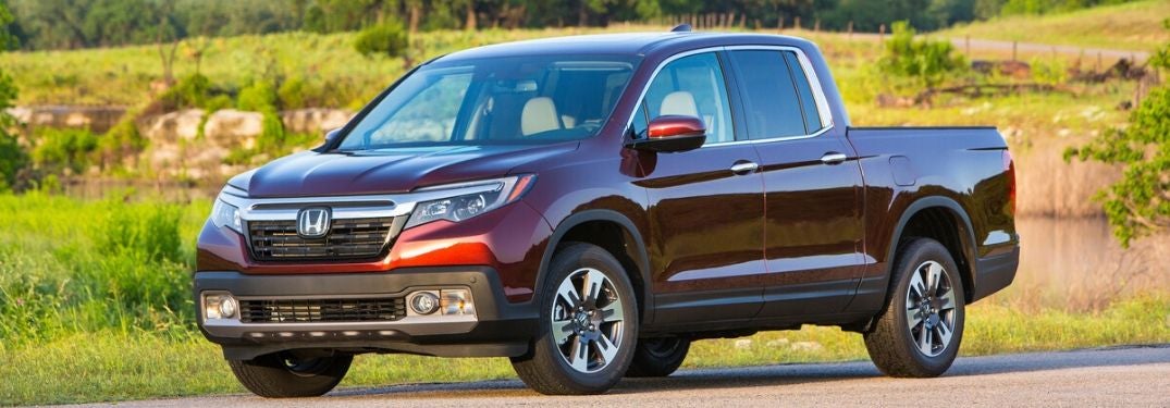 Red 2020 Honda Ridgeline on a Country Road