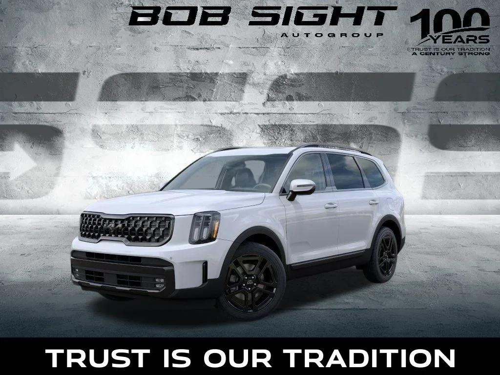 2025 Kia Telluride SUV in front of a stylized Bob Sight Automotive backdrop with ‘100 Years Trusted Service’ and ‘Trust Is Our Tradition’ branding.
