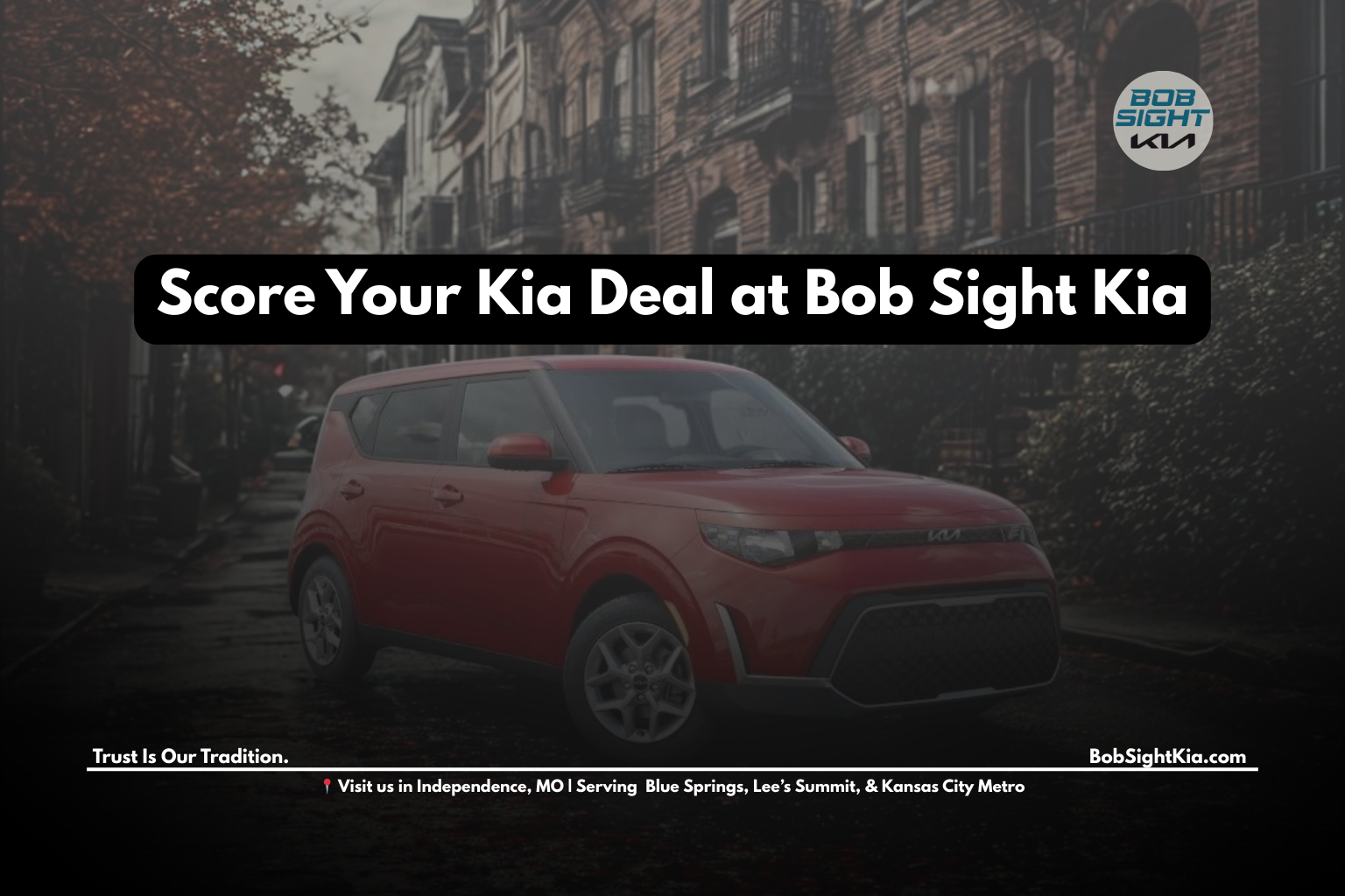 Happy customer standing looking at her a new Kia after buying at Bob Sight Kia in Independence, MO.