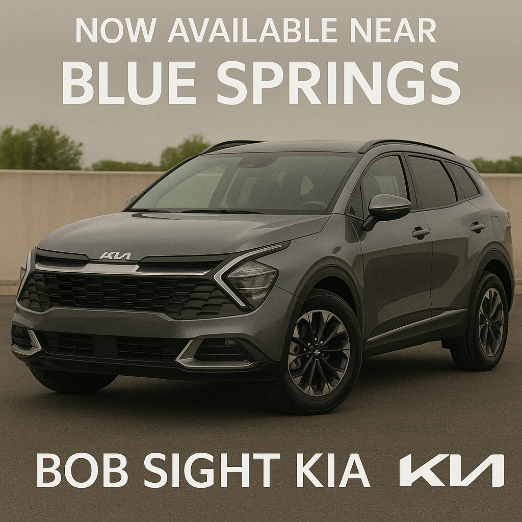 2025 Kia Sportage in gray parked on pavement with bold white text reading "Now Available Near Blue Springs" and "Bob Sight Kia" at the bottom.