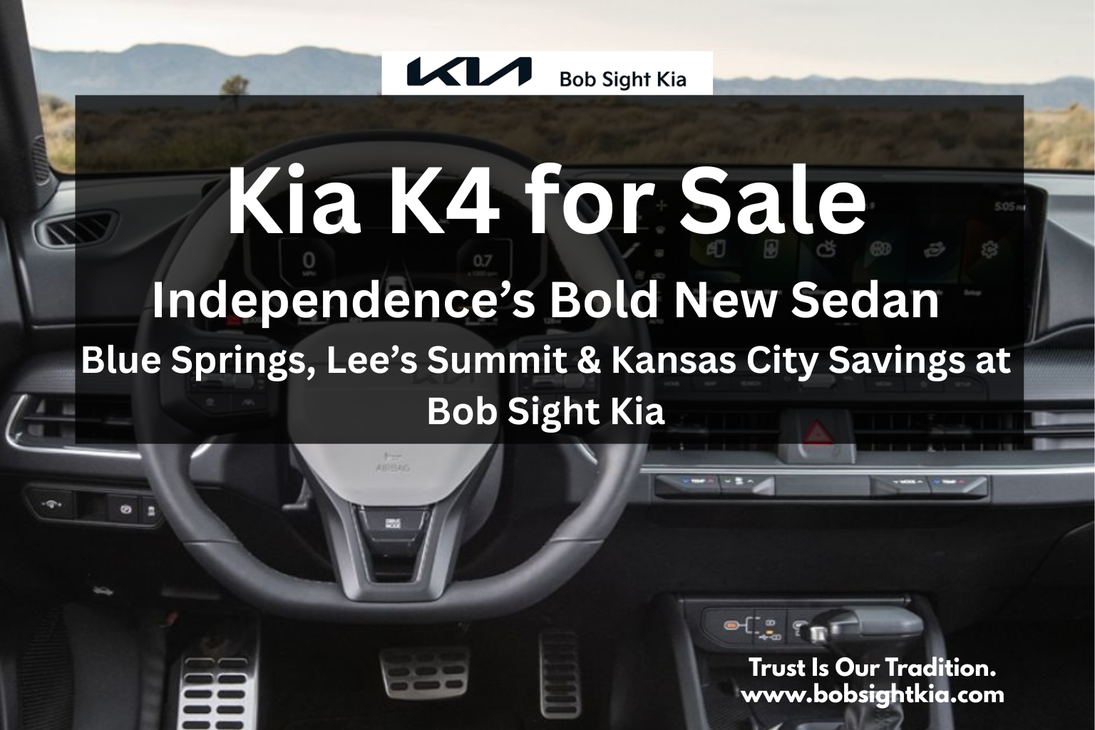 Kia K4 sedan parked at Bob Sight Kia in Independence MO, serving Blue Springs, Lee’s Summit, and Kansas City Metro.