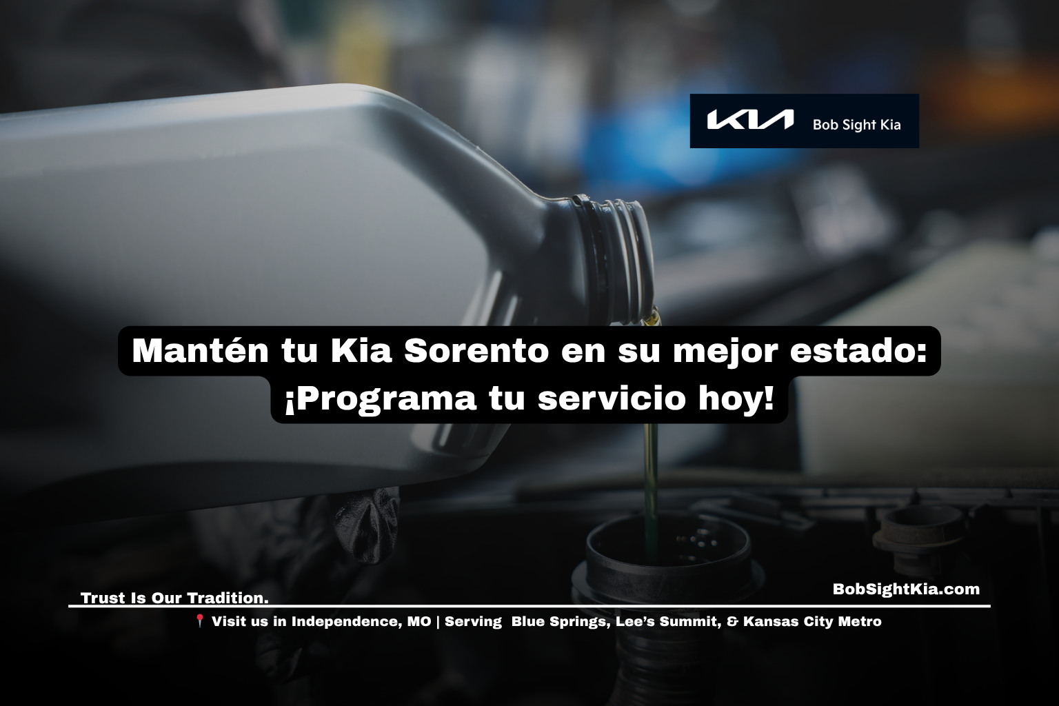 Técnico realizando un cambio de aceite a un Kia Sorento en Bob Sight Kia en Independence, Missouri