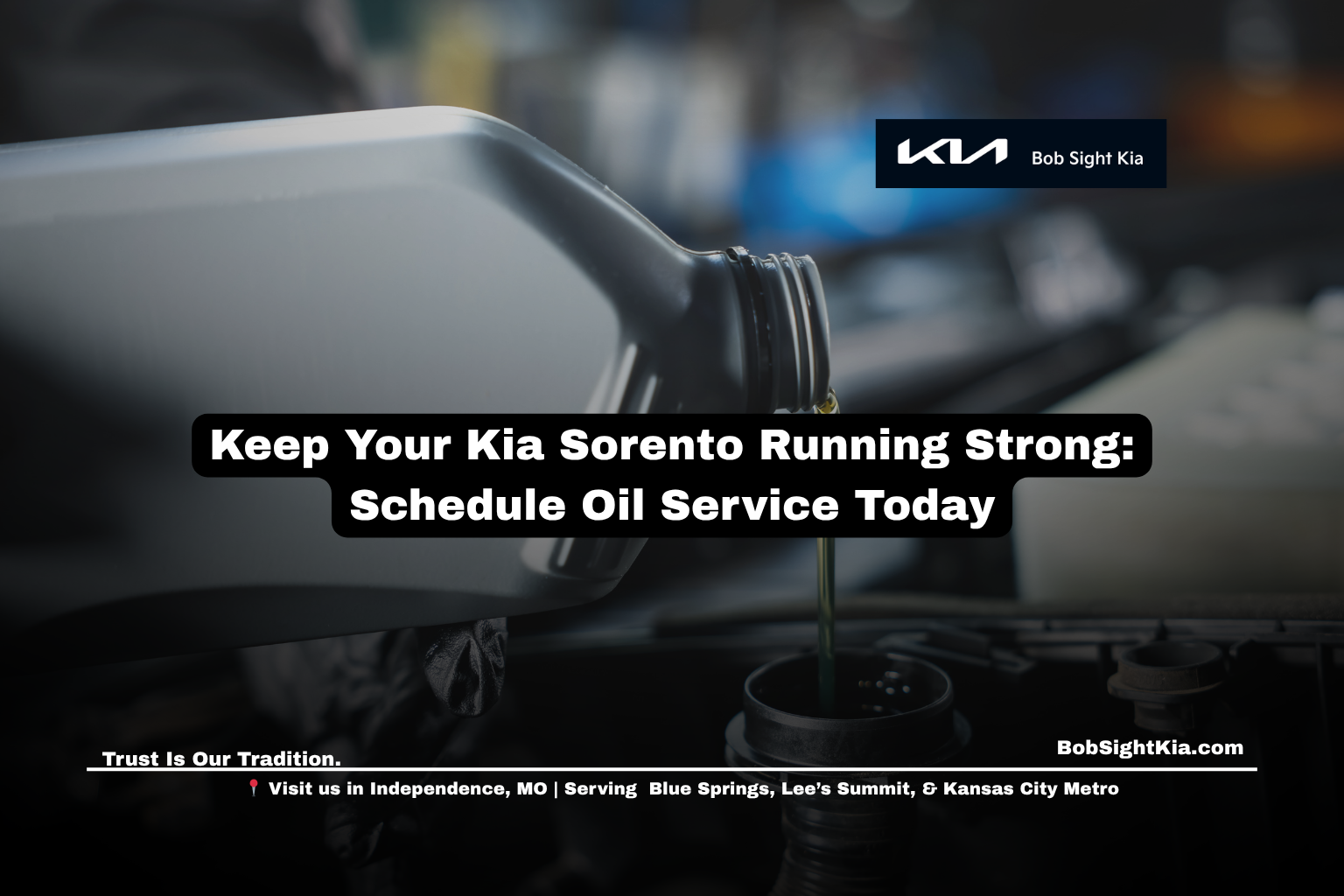 Technician performing oil change on a Kia Sorento at Bob Sight Kia in Independence, Missouri