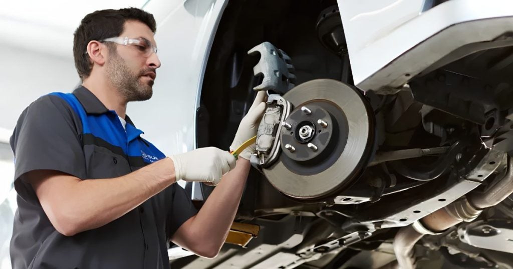 Brakes and steering parts are inspected during the Subaru 12k milestone check