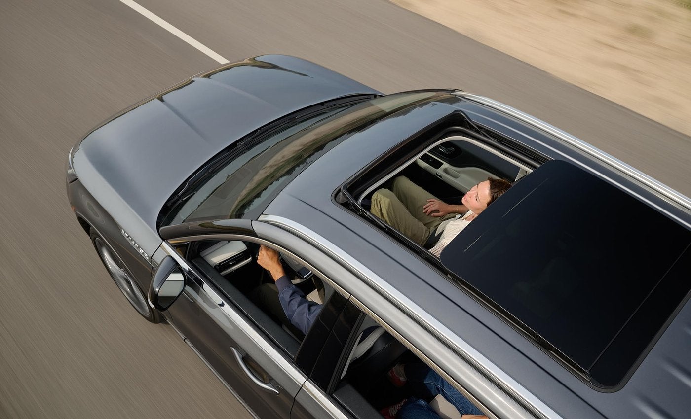 Overhead view of a 2027 Lincoln Aviator with the panoramic Vista Roof open Overhead view of a 2027 Lincoln Aviator with the panoramic Vista Roof open