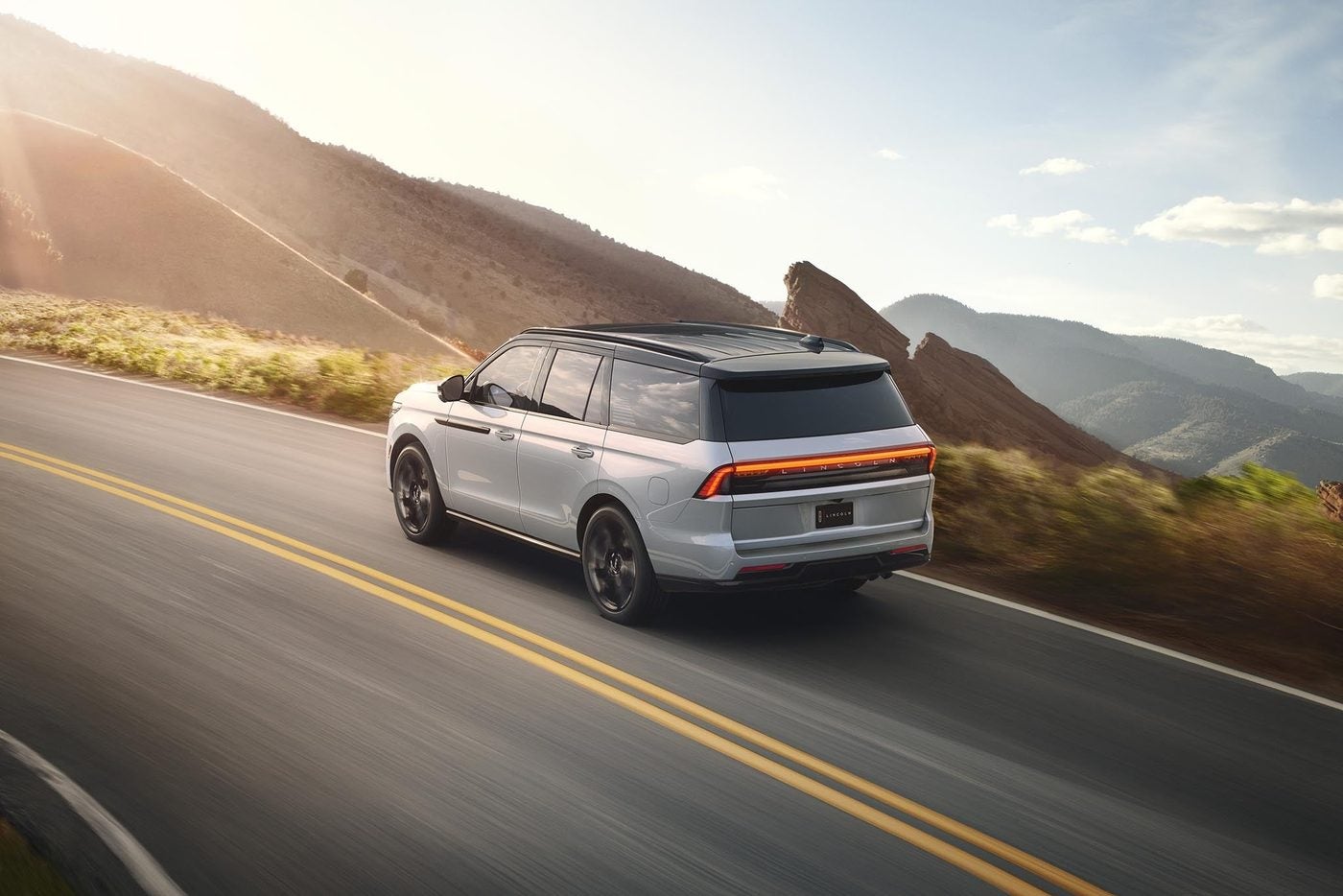 2027 Lincoln Navigator Black Label driving a mountain road, Southlake TX