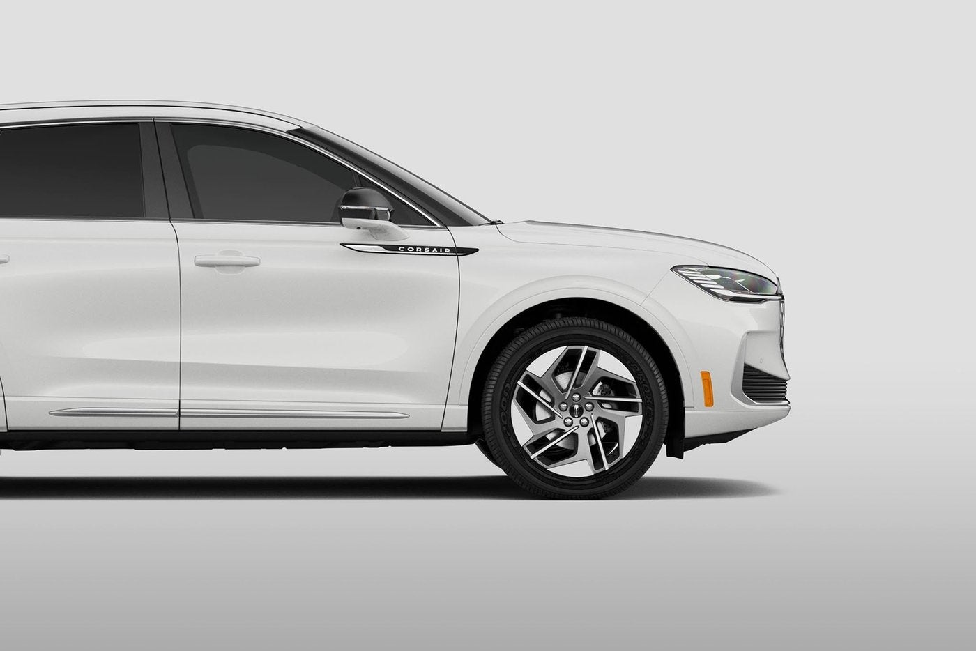 White Lincoln Corsair in side profile