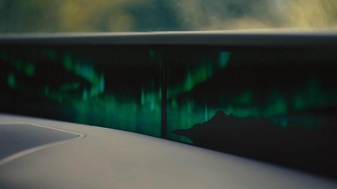 Lincoln Nautilus panoramic display across the dash showing a northern lights theme Lincoln Nautilus panoramic display across the dash showing a northern lights theme
