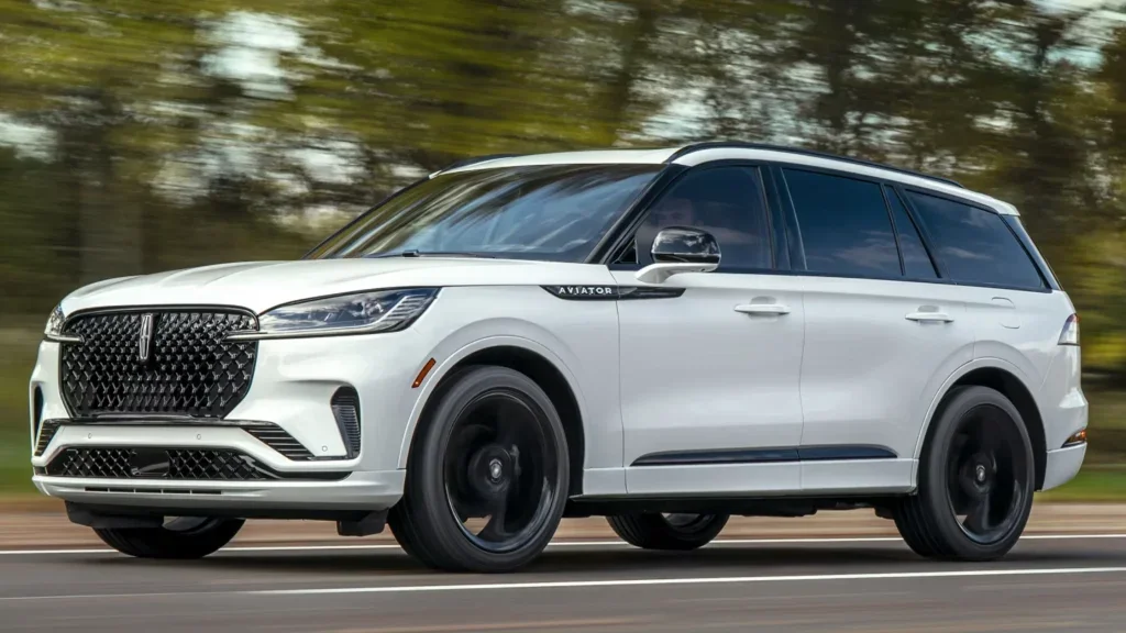The 2025 Lincoln Aviator® Reserve driving on a scenic road.
